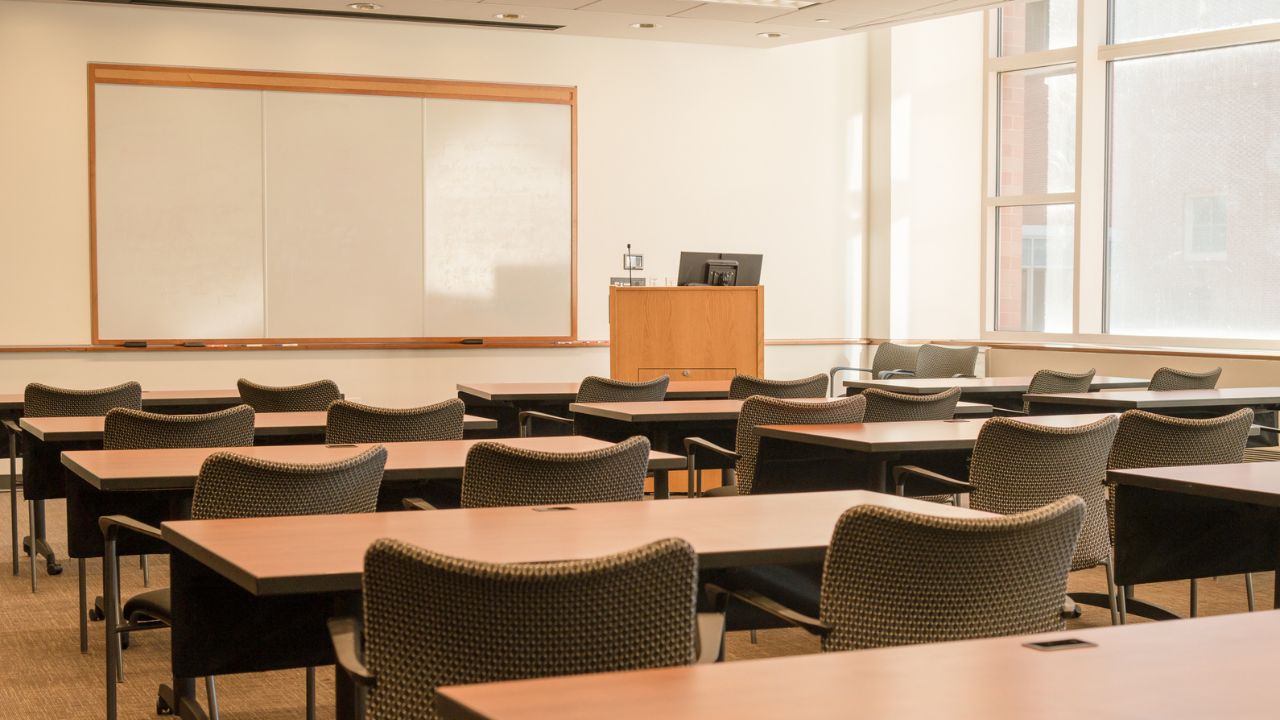 clean and healthy classroom with white boards and cushion chairs