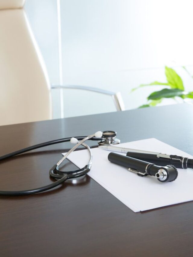 table with medical equipment and a office chair