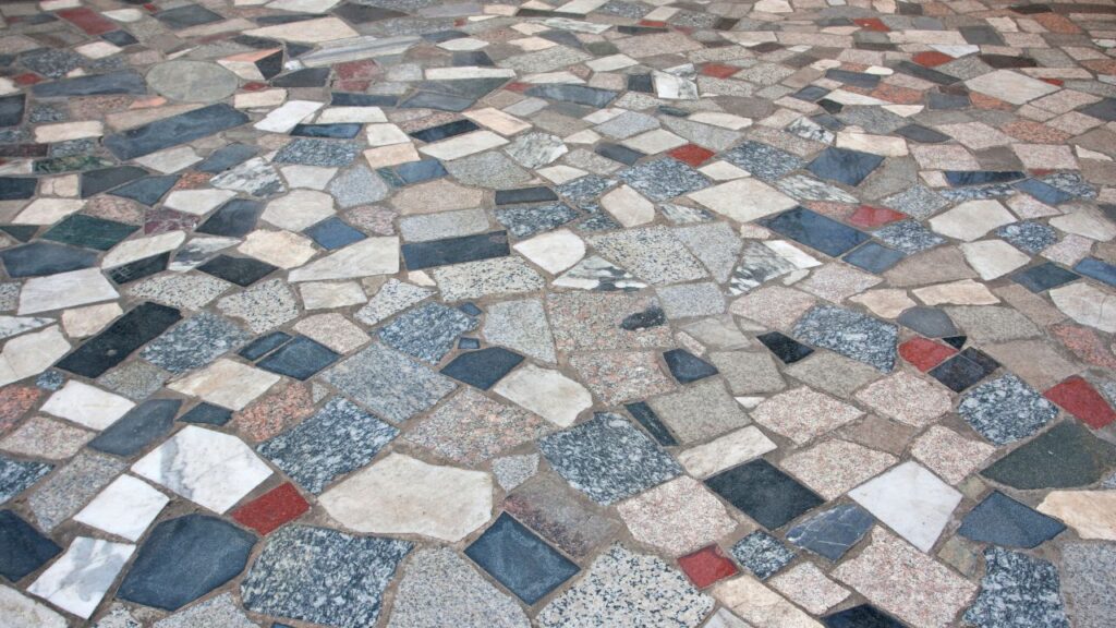 different types of hard floor combined, marble, stone and tile mixed together into one floor