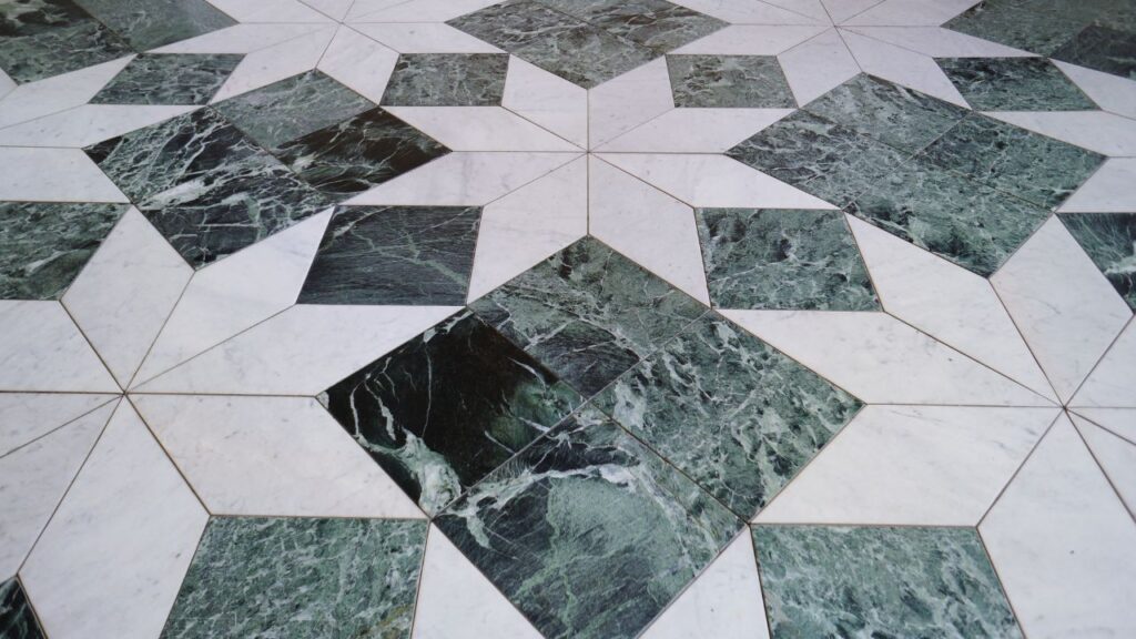 patterned marble floor in a star shape in black and white