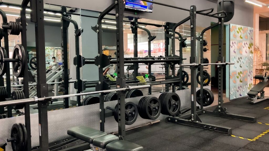 lifting station at the gym with weights and bars