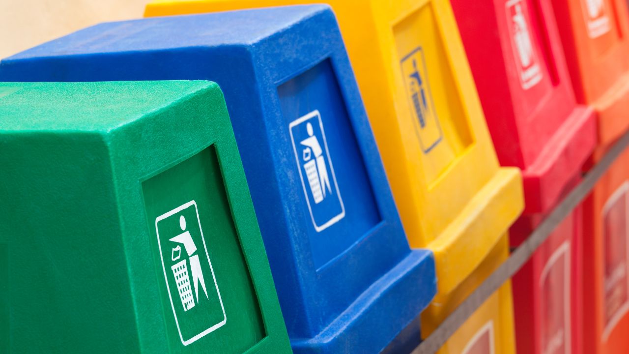 recycling bins lined up next to each other