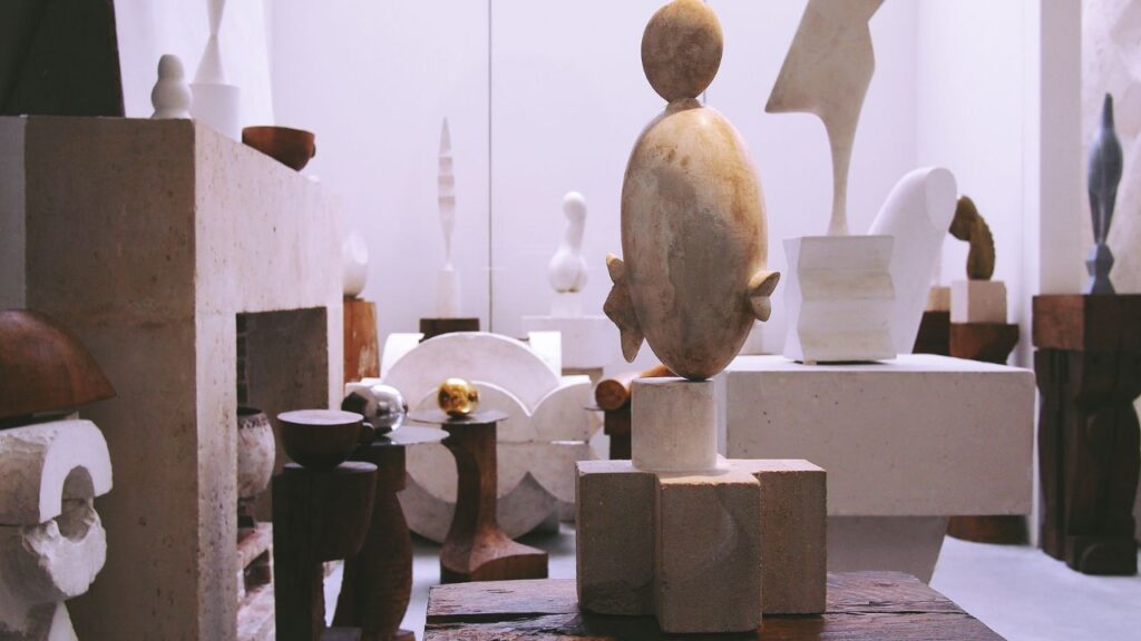 a bunch of different sculputures together, all are abstract forms