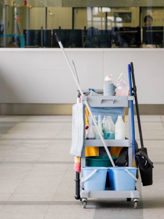 image of a porter service cleaning cart on a corridor of an office building