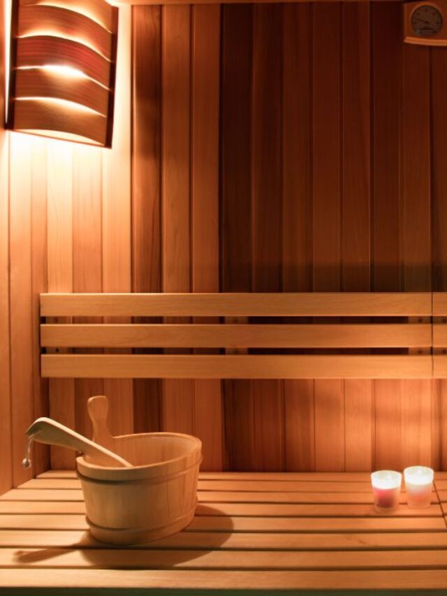 image of a wooden sauna with bench, bucket and towels for wellness clinic cleaning tips