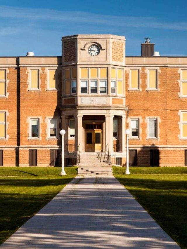 front of a school building in New York