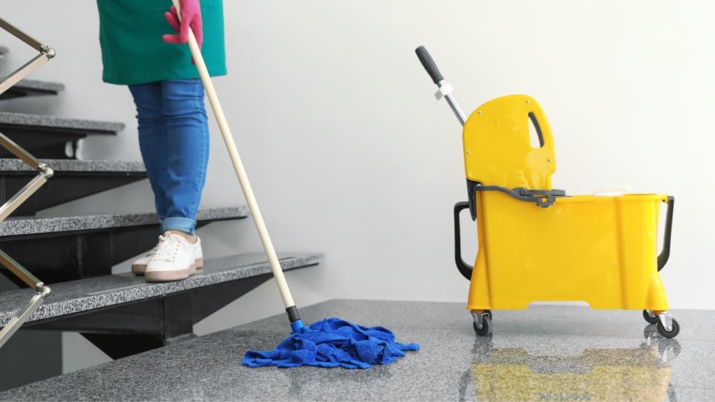 woman cleaning staff cleaning marble stairs