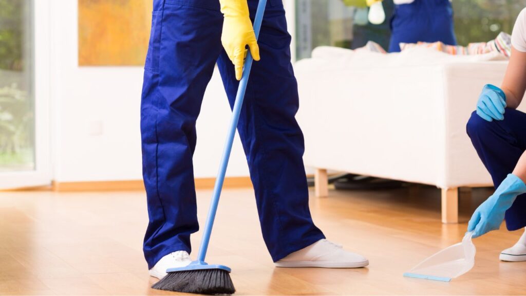 sweeping hardwood floor